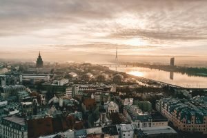 aerial photo of city under cloudy sky